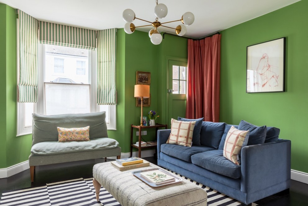West London family  | Sitting room detail - showing old front door | Interior Designers